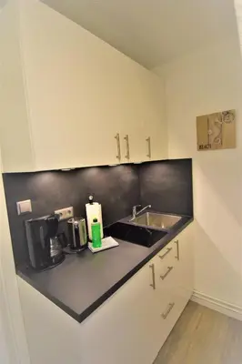 Küche/Küchenzeile in der Unterkunft Haus Schatz am Meer Appartement 12 für 1 Person Schatzkammer