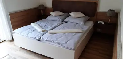 Ein Bett oder Betten in einem Zimmer der Unterkunft Deichresidenz Büsum