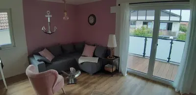 Ein Sitzbereich in der Unterkunft Deichresidenz Büsum