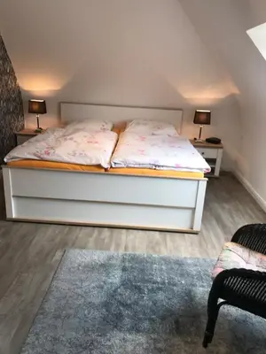 Ein Bett oder Betten in einem Zimmer der Unterkunft Haus Andrea -Wohnung oben