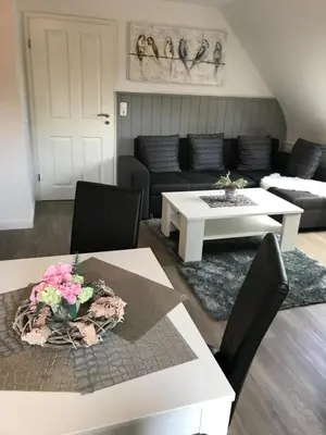 Ein Sitzbereich in der Unterkunft Haus Andrea -Wohnung oben