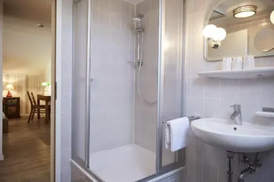 Ein Badezimmer in der Unterkunft Bernstein-Hotel Bootshaus