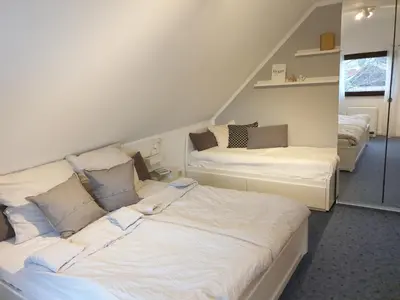 Ein Bett oder Betten in einem Zimmer der Unterkunft Ferienhaus 