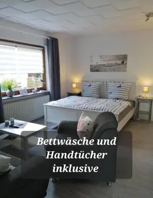 Ein Bett oder Betten in einem Zimmer der Unterkunft Steinmarner Bude 2