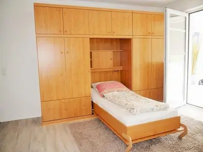 Ein Bett oder Betten in einem Zimmer der Unterkunft Seedeich Apartment
