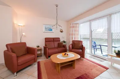 Ein Sitzbereich in der Unterkunft Haus Duhner Brise, Whg 3, Seesicht