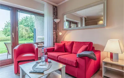 Ein Sitzbereich in der Unterkunft Awesome Apartment In Friedrichskoog