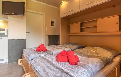 Ein Bett oder Betten in einem Zimmer der Unterkunft Awesome Apartment In Friedrichskoog