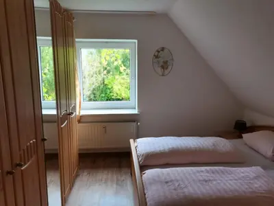 Ein Bett oder Betten in einem Zimmer der Unterkunft Kleine Krabbe
