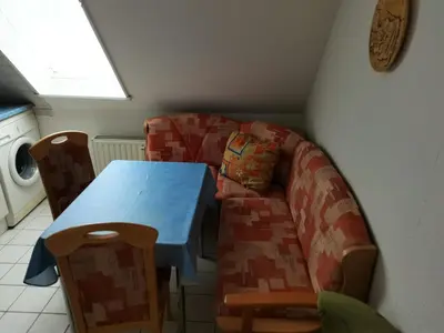 Ein Sitzbereich in der Unterkunft Kleine Krabbe