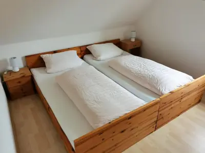 Ein Bett oder Betten in einem Zimmer der Unterkunft Kleine Krabbe