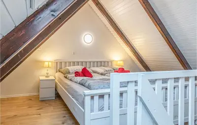 Ein Bett oder Betten in einem Zimmer der Unterkunft Awesome Apartment In Friedrichskoog