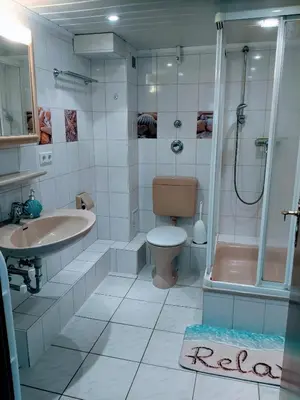 Ein Badezimmer in der Unterkunft Ferienwohnungen Am Grooten Steen 16