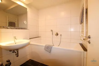 Ein Badezimmer in der Unterkunft Residenz Hohe Lith Wohnung 04 01
