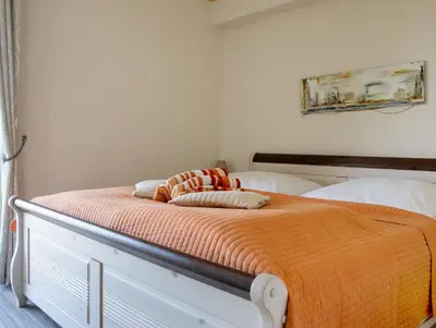 Ein Bett oder Betten in einem Zimmer der Unterkunft Ferienwohnung Wattfinca