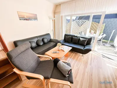 Ein Sitzbereich in der Unterkunft Ferienhaus am Ringwall 8