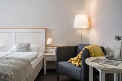 Ein Bett oder Betten in einem Zimmer der Unterkunft Akzent Hotel Dorn