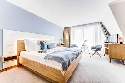 Ein Bett oder Betten in einem Zimmer der Unterkunft Hotel Muschelgrund