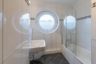 Ein Badezimmer in der Unterkunft Strand Palais 18