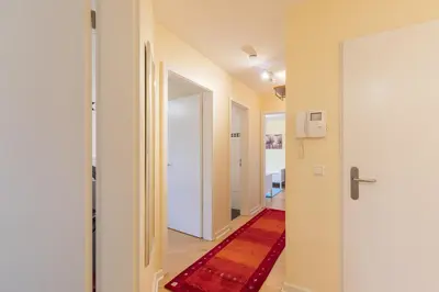 Ein Bett oder Betten in einem Zimmer der Unterkunft Strand Palais 18