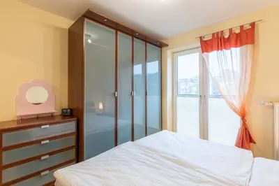 Ein Bett oder Betten in einem Zimmer der Unterkunft Strand Palais 18