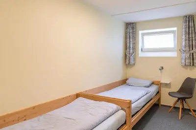 Ein Bett oder Betten in einem Zimmer der Unterkunft Knechtsand 417