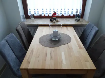 Ein Sitzbereich in der Unterkunft Wunderschöne Ferienwohnung ´Mal seh´n`direkt am Nordseedeich