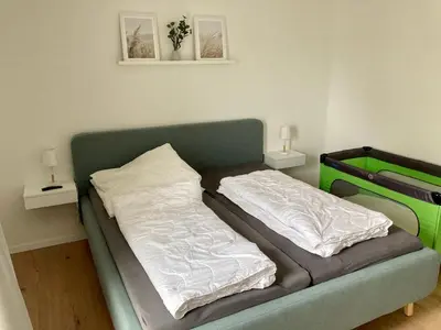 Ein Bett oder Betten in einem Zimmer der Unterkunft Ferienwohnung Hohe Lith