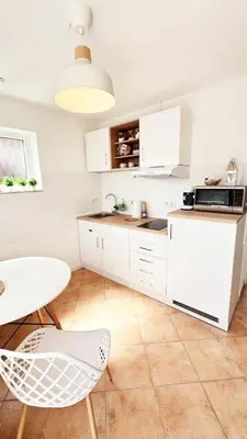 Küche/Küchenzeile in der Unterkunft Lust auf Meer - Appartement Ferienwohnung Terrasse kleine Hunde willkommen Nähe Nordsee