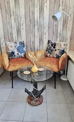 Ein Sitzbereich in der Unterkunft Lust auf Meer - Appartement Ferienwohnung Terrasse kleine Hunde willkommen Nähe Nordsee