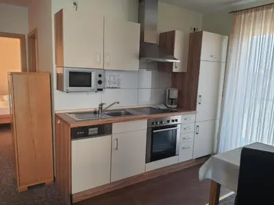 Küche/Küchenzeile in der Unterkunft Landhaus Braband Ferienwohnungen - Cuxhavener Straße 96