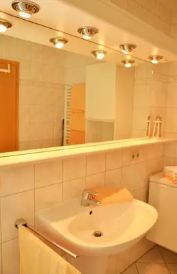 Ein Badezimmer in der Unterkunft Landhaus Braband Ferienhaus - Rugenbargsweg 23