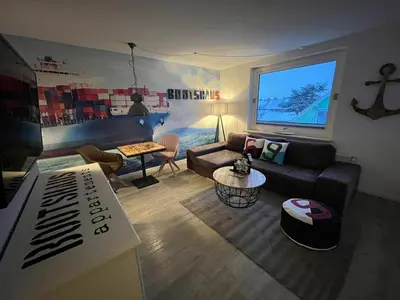 Ein Sitzbereich in der Unterkunft Bootshaus Appartements