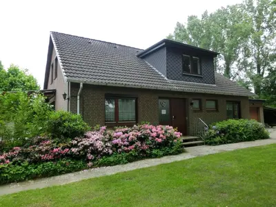 Ein Garten an der Unterkunft Ferienwohnung Wiesenweg