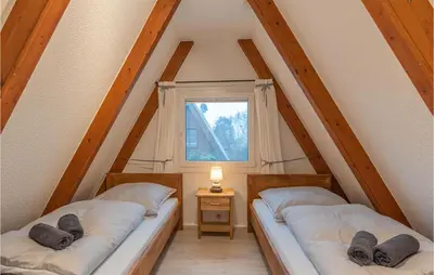 Ein Bett oder Betten in einem Zimmer der Unterkunft Stunning Home In Friedrichskoog