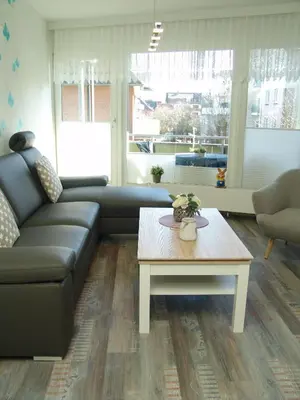 Ein Sitzbereich in der Unterkunft Strandresidenz 108