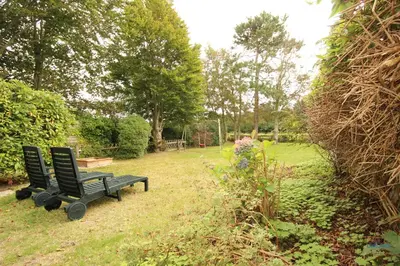 Ein Garten an der Unterkunft Ferienhaus Christian Brütt Weg 23