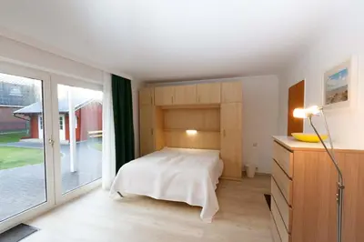 Ein Bett oder Betten in einem Zimmer der Unterkunft Villa Sonnenschein