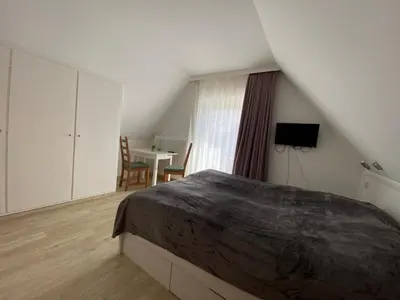 Ein Bett oder Betten in einem Zimmer der Unterkunft Villa Sonnenschein