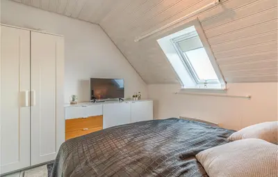 Ein Bett oder Betten in einem Zimmer der Unterkunft Stunning Apartment In Friedrichskoog