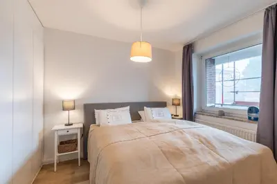 Ein Bett oder Betten in einem Zimmer der Unterkunft Medemsand 203