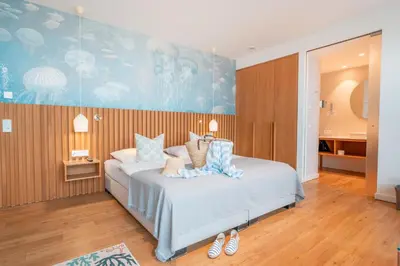 Ein Bett oder Betten in einem Zimmer der Unterkunft Hotel Strandhus
