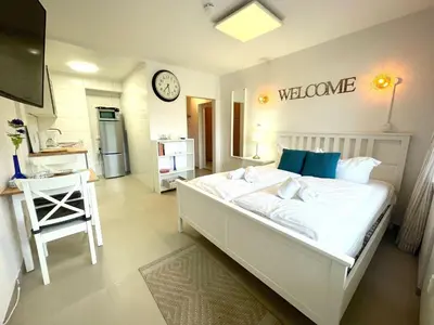 Ein Bett oder Betten in einem Zimmer der Unterkunft Haus Frauenpreiss FeWo 404