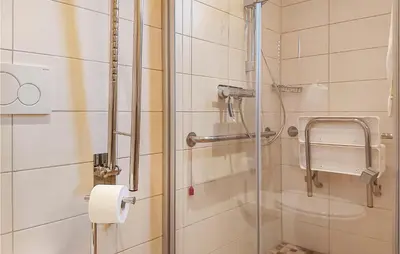 Ein Badezimmer in der Unterkunft Lovely Home In Wurster Nordseeküste