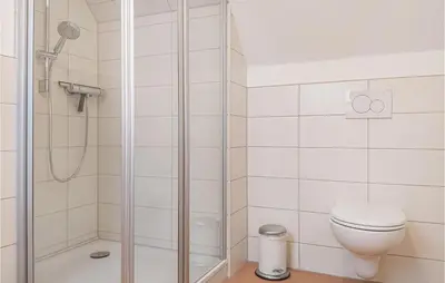 Ein Badezimmer in der Unterkunft Lovely Home In Wurster Nordseeküste