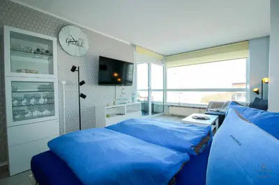Ein Bett oder Betten in einem Zimmer der Unterkunft Haus Frische Brise Wohnung 7 10 Inselblick
