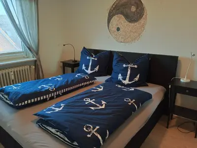 Ein Bett oder Betten in einem Zimmer der Unterkunft Direkt am Meer in Büsum