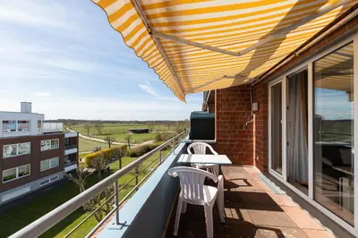Ein Balkon oder eine Terrasse in der Unterkunft Knechtsand 455