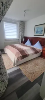 Ein Bett oder Betten in einem Zimmer der Unterkunft Appartementhaus 