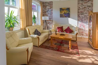 Ein Sitzbereich in der Unterkunft Wunderschöne und moderne Altstadtwohnung im Herzen von Otterndorf